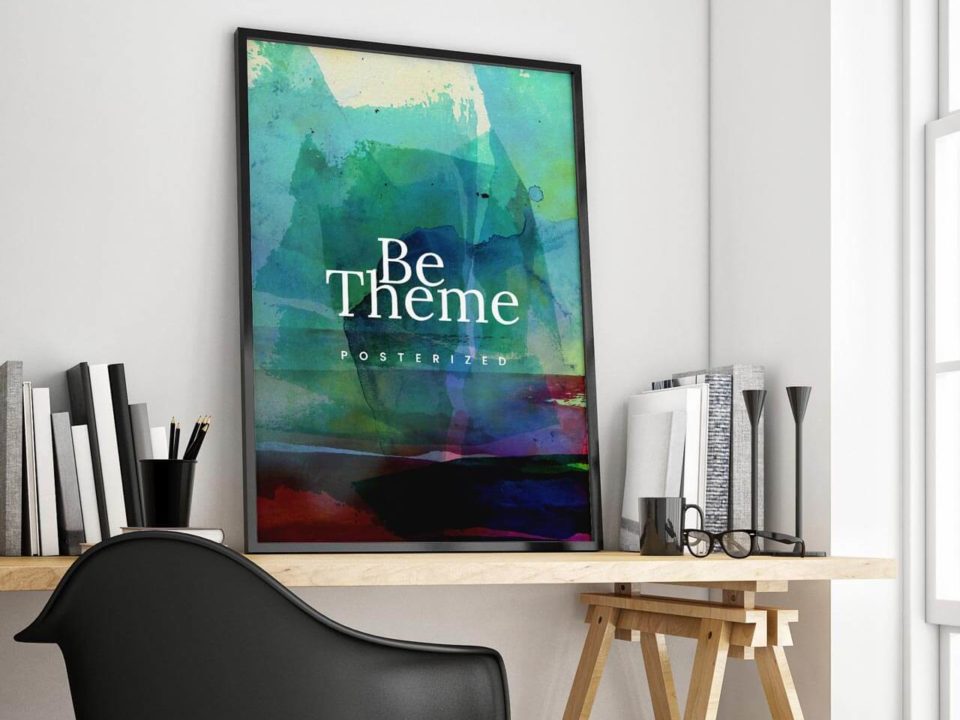 Colorful abstract poster on a desk.